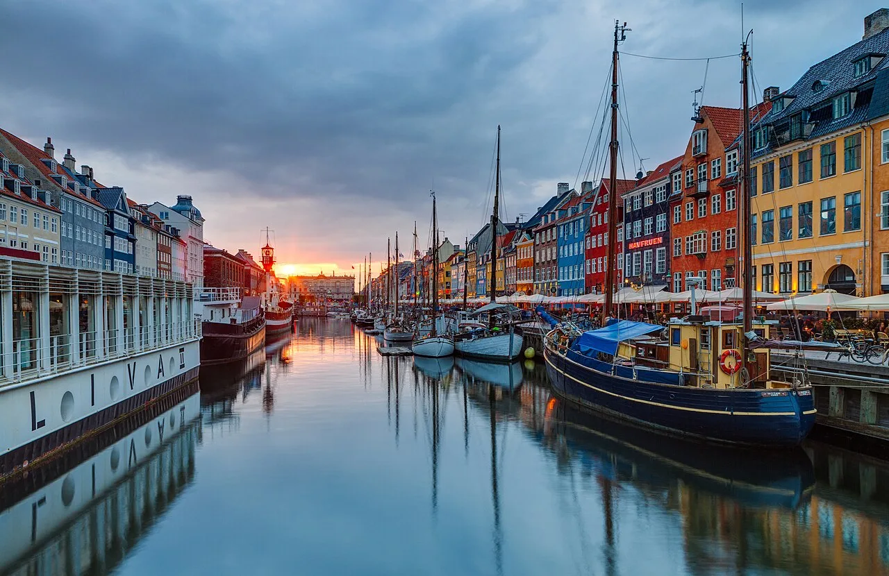 Colourful Nyhavn waterfront at sunset, Copenhagen