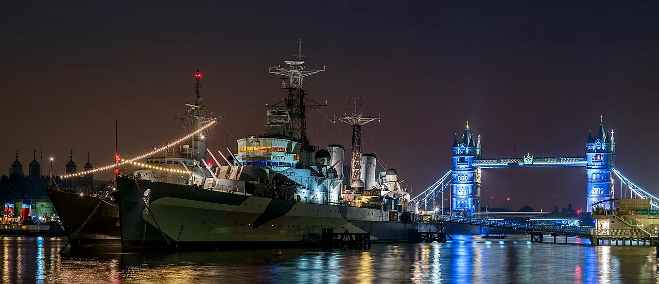 Tower Bridge and HMS Belfast before sunrise, London
