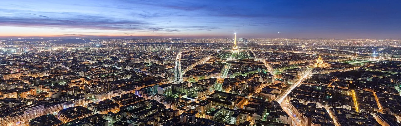 Eiffel Tower and Paris illuminated at night