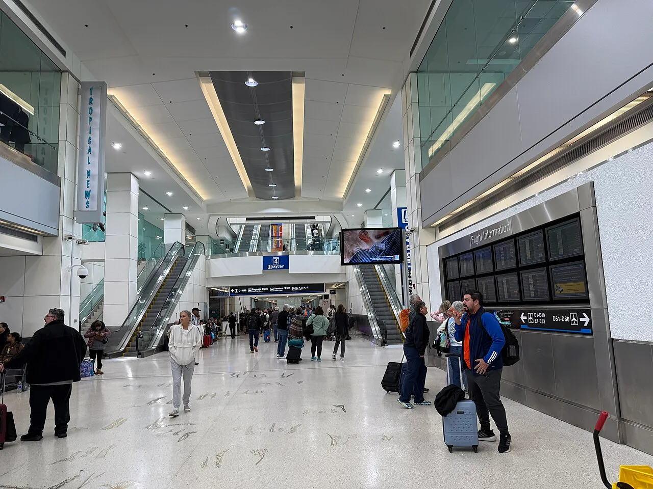 Premium airport lounge — representative of Miami International Concourse D lounges.