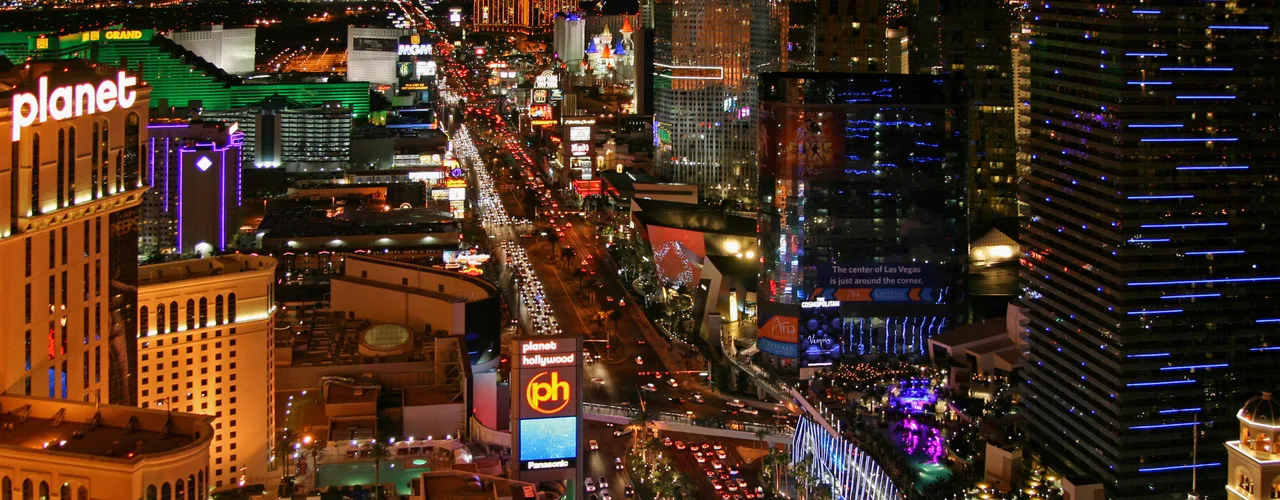 Las Vegas Strip lit at night with casino resort towers along the boulevard
