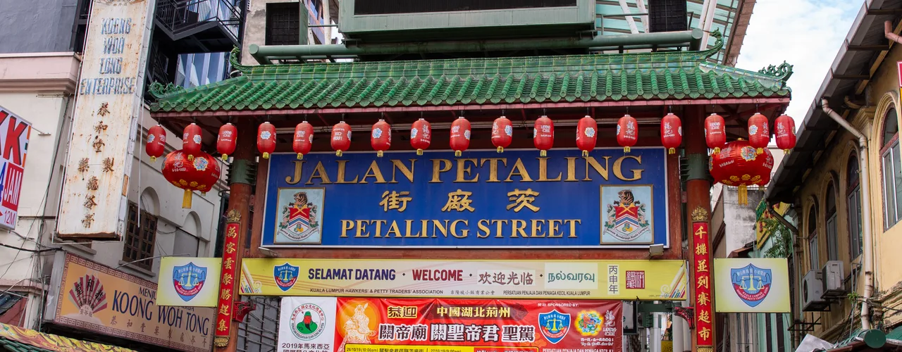 Petaling Street market under its green canopy in Kuala Lumpur Chinatown