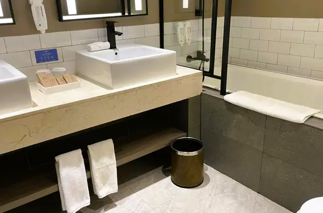 Washbasin and amenities in a guest bathroom at Citadines Connect Airport Jakarta