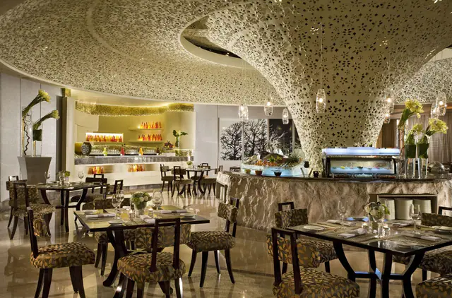 Sculpted gold ceiling over the dining room at Hotel Mulia Senayan, Jakarta