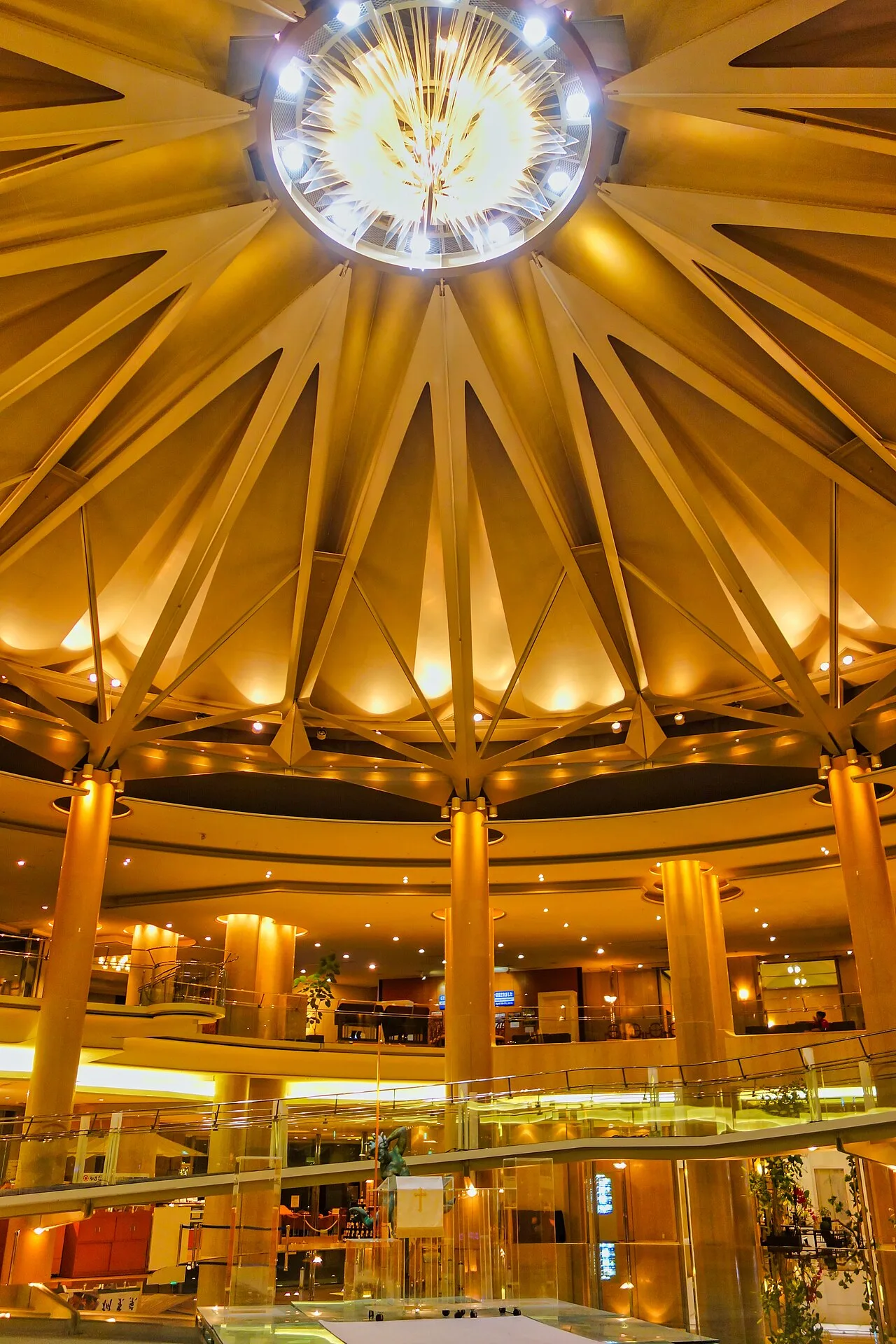 Sunlit atrium lobby of a grand hotel
