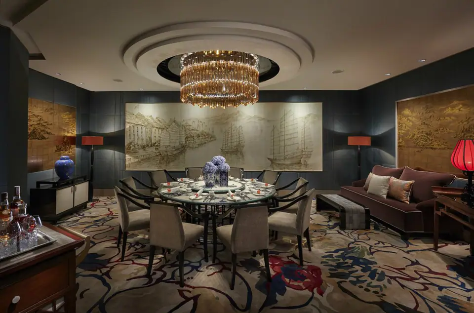 Private dining room under a crystal chandelier at Mandarin Oriental, Jakarta