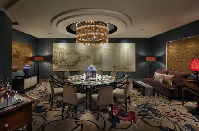 Private dining room under a crystal chandelier at Mandarin Oriental, Jakarta