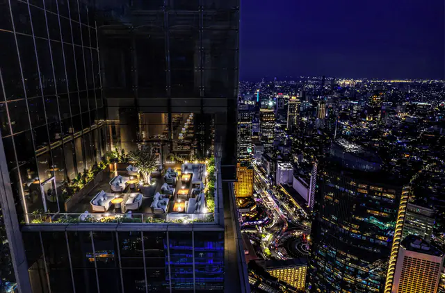 Rooftop terrace dining at Pan Pacific Jakarta at night