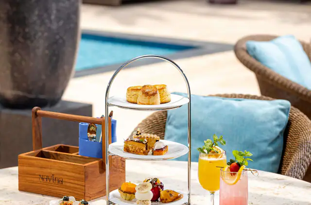 Poolside afternoon tea service at Raffles Jakarta