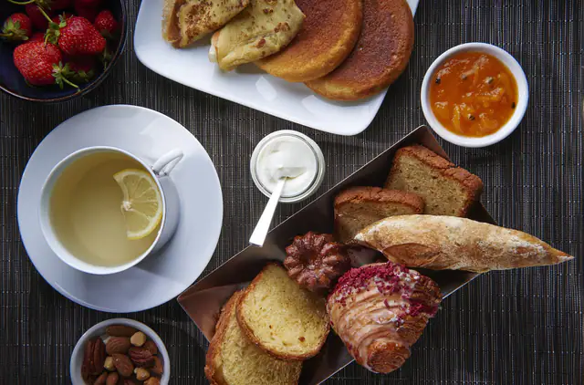 Breakfast breads and preserves spread at Raffles Jakarta