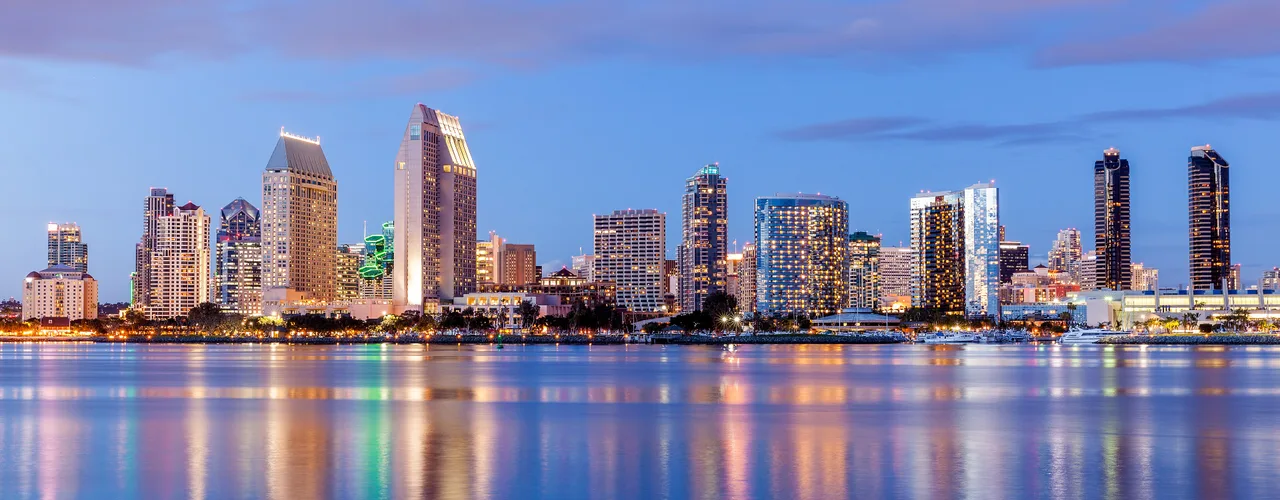 San Diego downtown skyline at dusk across the bay from Coronado