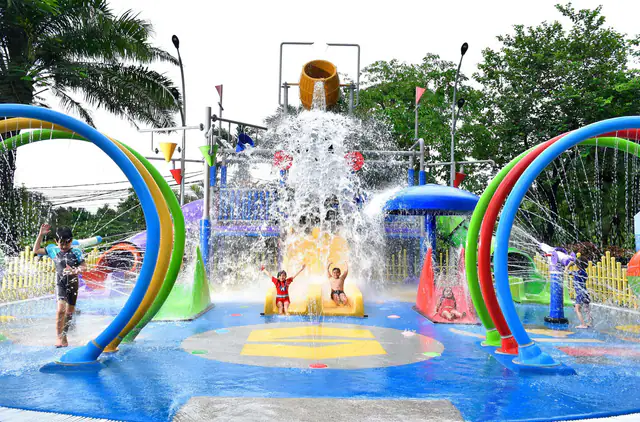 Water-play structures and slides at the Shangri-La Jakarta family pool