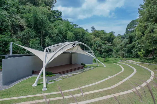 Hillside amphitheatre lawn in The Gaia Hotel Bandung grounds