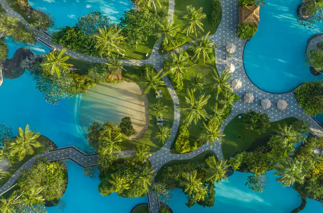 Aerial view of the lagoon pool network at The Laguna Bali