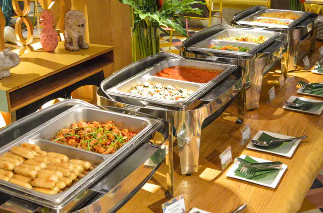 Hot breakfast trays at the Tijili Hotel Seminyak buffet