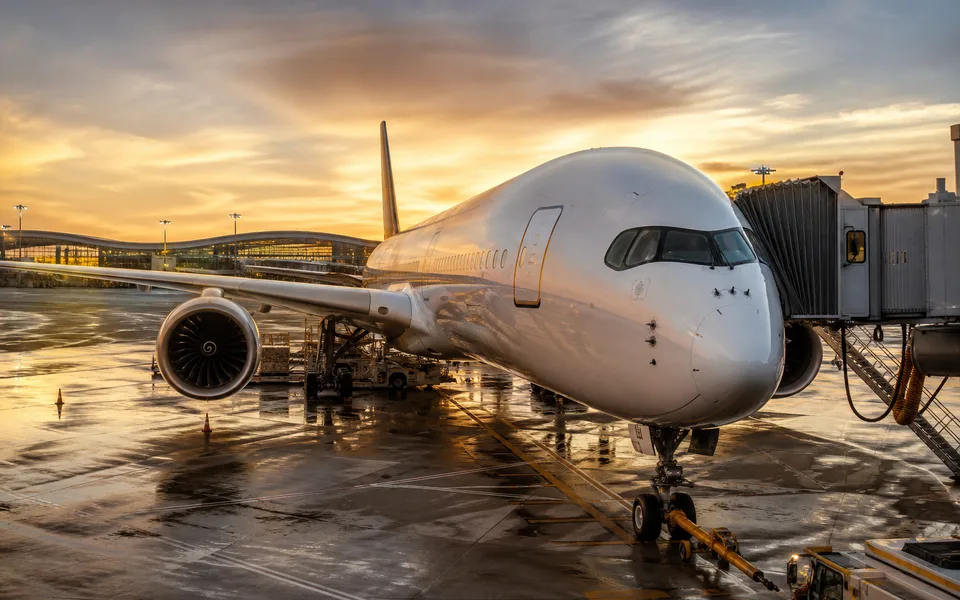 Widebody airliner at a glass airport gate — world's best airlines overall ranking (AI-generated illustration)
